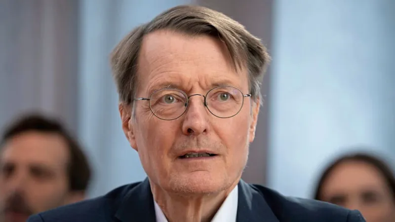 Lauterbach's Emigration Comments Ignite Political Firestorm; FDP Demands Action