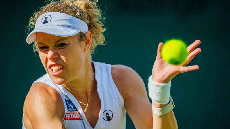 Siegemund's Wimbledon Fury: On-Court Warning Sparks Ostapenko Clash
