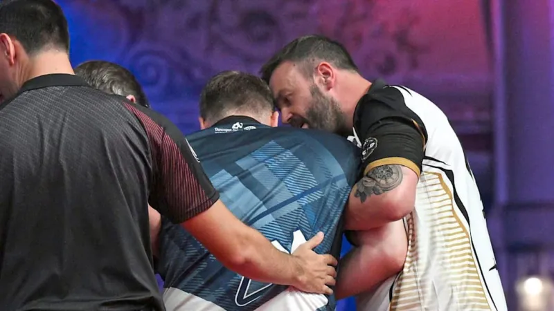 Darts Pro Cameron Menzies Collapses Onstage, Withdraws from Tournament