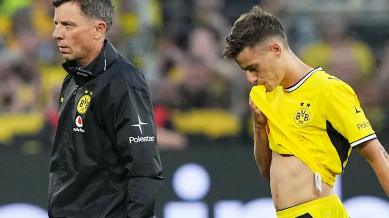 Bittersweet Triumph: Konstantelias Injury Dims Dortmunds Bundesliga Opener