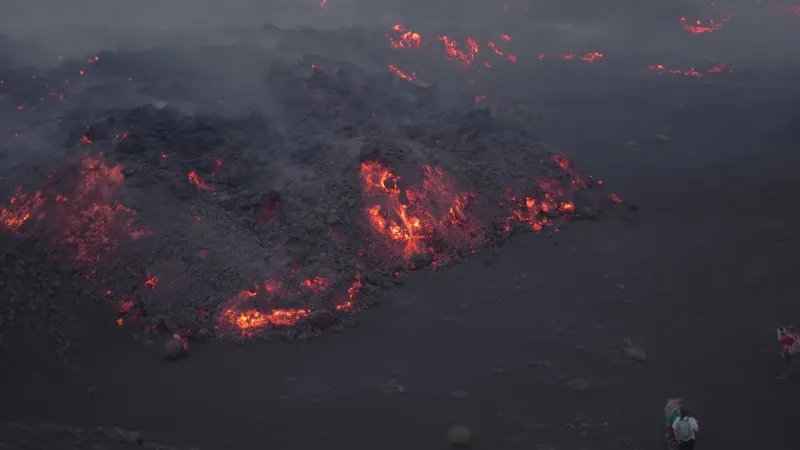 Etna's Fiery Advance: Lava Front Descends, Igniting Sicilian Landscape