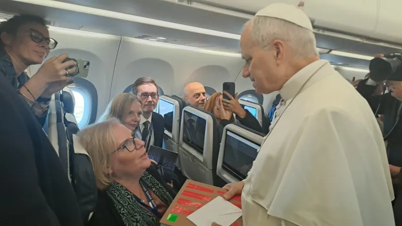 Pope Francis Honors Journalist on Papal Flight, Citing Book Role
