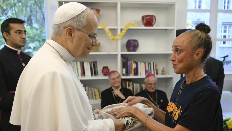 Pope Francis in Paris: Migrant Center Visit Precedes Lourdes Pilgrimage