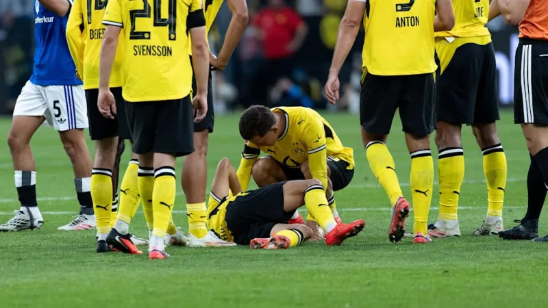 Konstantelias Injury Clouds Dortmund Victory; Coach Fears Worst-Case Scenario