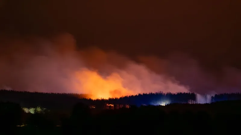 Germany Faces Dual Wildfire Challenge: Monschau Prepares for Evacuation