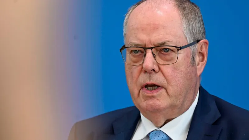 German Firewall Debate: Steinbruck Urges AfD De-radicalization Strategy