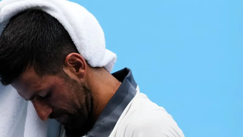 Heat Overcomes Djokovic: Star Battles Illness, Exits Cincinnati Early