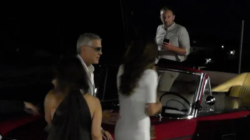 Clooneys Grace Capri: Elegant Island Retreat Captured Aboard Open Taxi