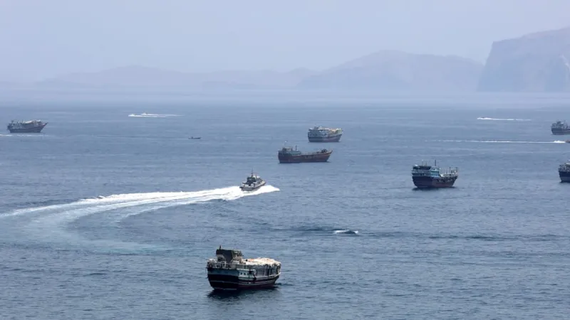 Iran Strikes Cargo Ship; UN Halts Hormuz Evacuations Amid Tensions