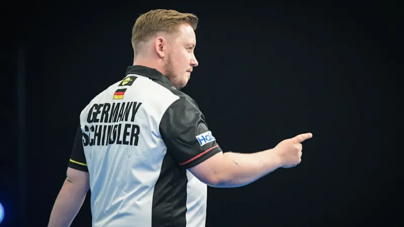German Darts Duo Advances, Hempel Clashes with Schindler Live on Air