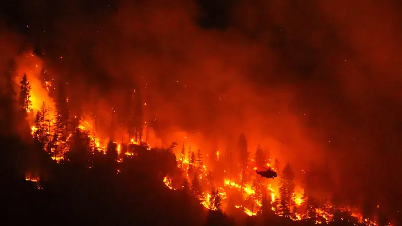 British Columbia Wildfires Rage, Forcing 20,000 Evacuations Amid Emergency