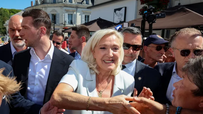 Le Pen Kicks Off Campaign Unmonitored; Appeal Looms