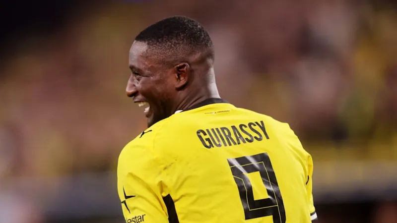 Guirassy Double Propels Dortmund to Commanding Champions League Start