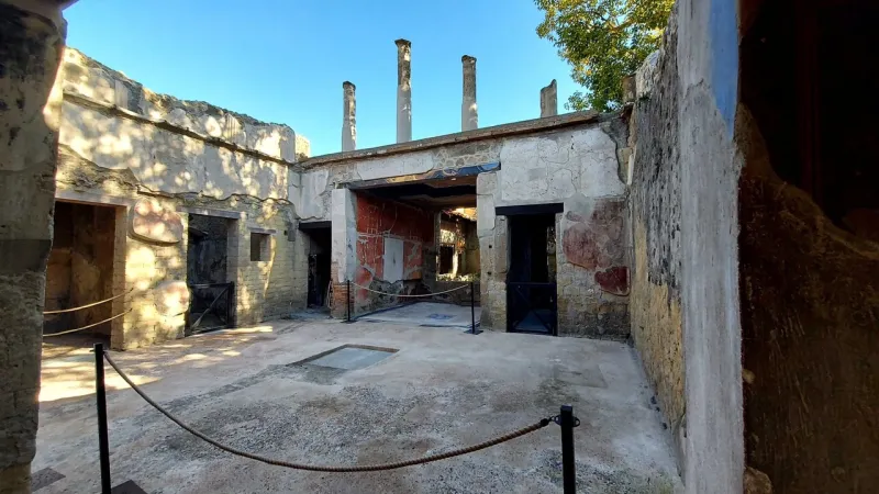 Herculaneum's Carbonized Furniture House Reopens, Revealing Ancient Roman Life